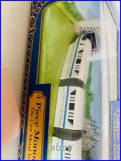 Disney Theme Park Collection 4 Piece die cast metal vehicle