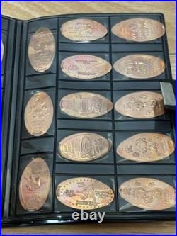 Disney & Universal Souvenir Medallion Set with Book, Used Disney & Universal Souvenir Medallion Set with Book, Used