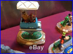 Four (4) Disney, Ron Lee, Theme Park Ride Vehicles, signed and numbered